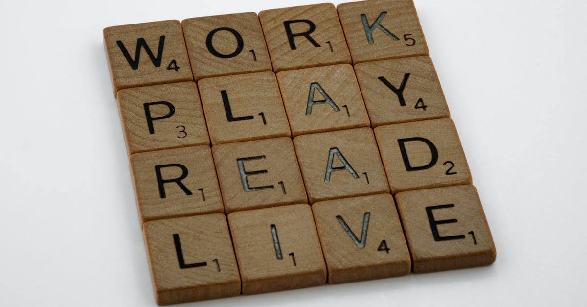 How can I live and work in the UK? [closed] - Close-Up Shot of Letter Tiles