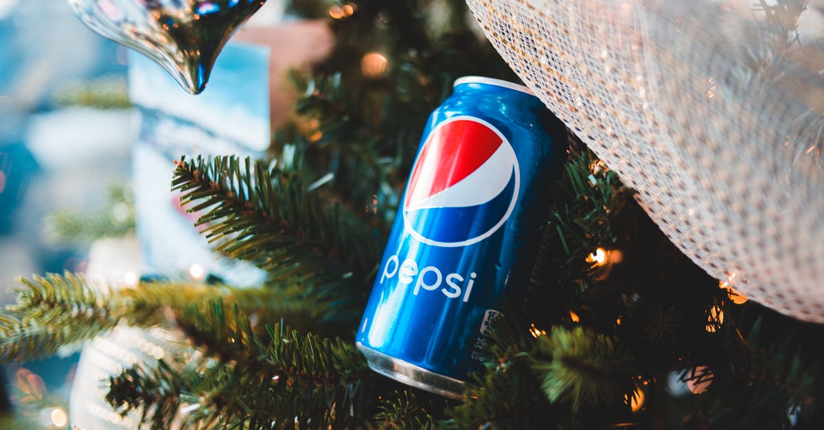 How can I proceed regarding a possibly-lost letter when travelling? - Shiny can of soft drink on Christmas tree branch