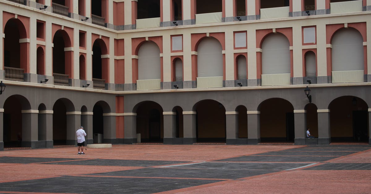 How can I travel between San Juan and Fajardo, Puerto Rico? - Student Standing On School Ground