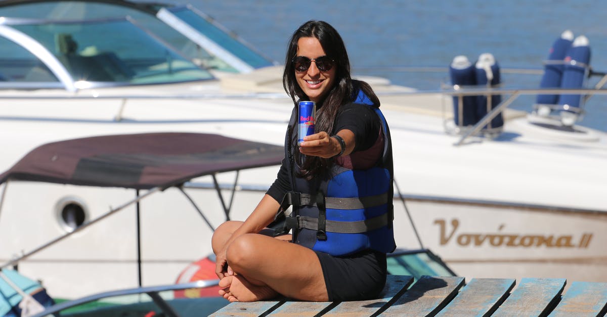 How can Norwegian Customs know who repaired their boats abroad? - Woman Holding a Can Sitting on a Wooden Deck