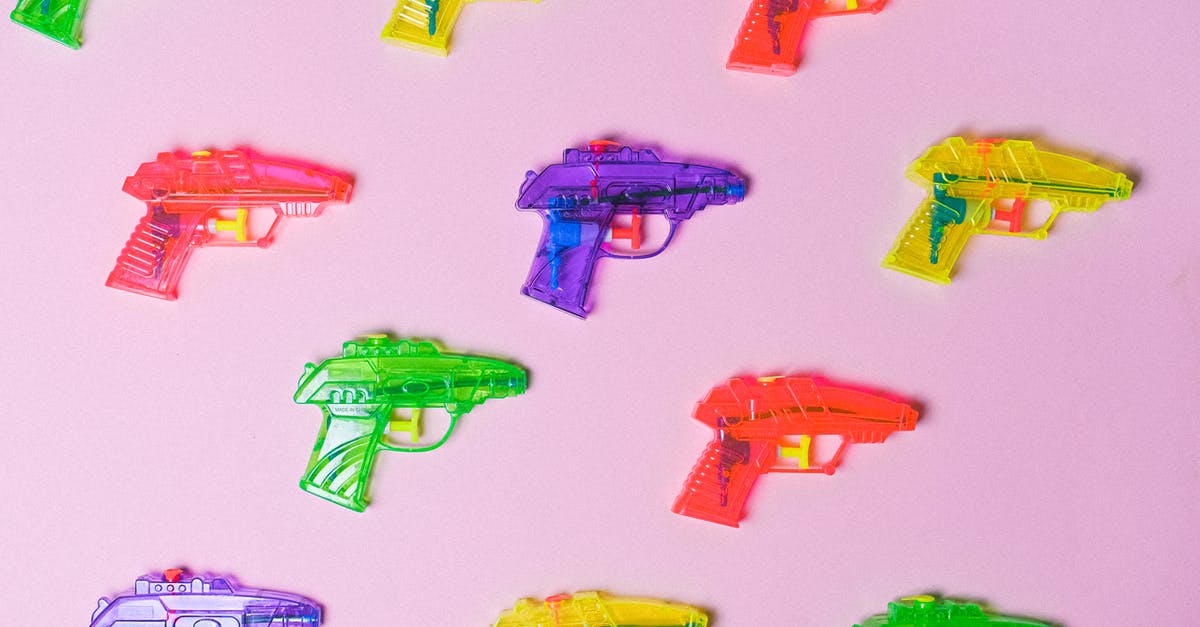 How can you protect yourself against identity theft? - Top view of various multicolored toys for fight arranged on pink background as representation of game