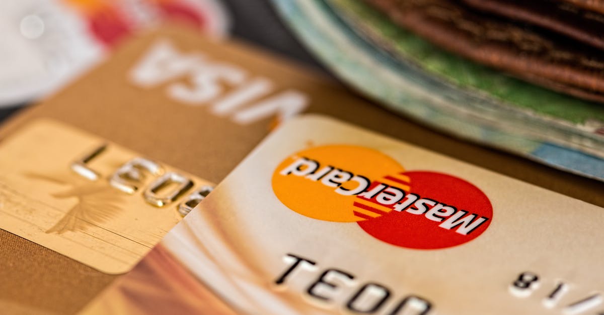 How card / e-payment friendly is Dubai - Close-up Photography Two Brown Cards