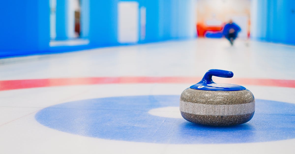 How do I get to Eglwys Gwyddelod Stone Circle? - Curling stone placed in house on ice rink