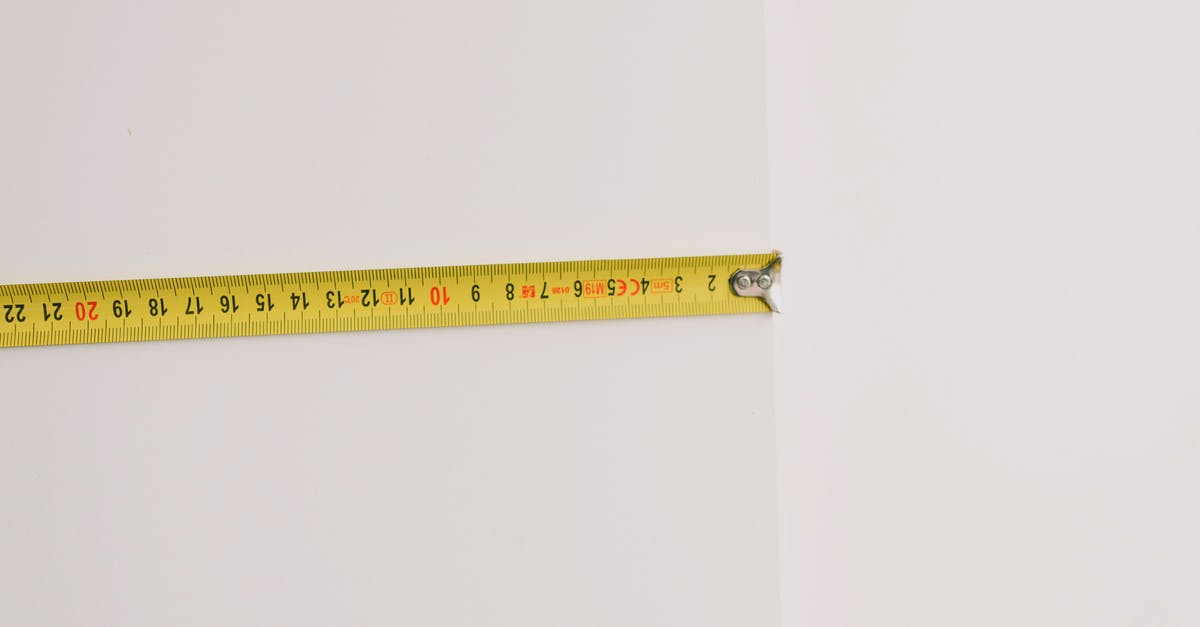 How do I prepare for the possibility of being mugged in the US / Caribbean? - Measuring tape on empty white background