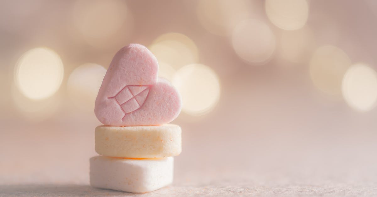 How do you find out whether or not certain vitamins are legal or bring into a country? - Three Beige, Yellow, and Pink Heart Marshmallows