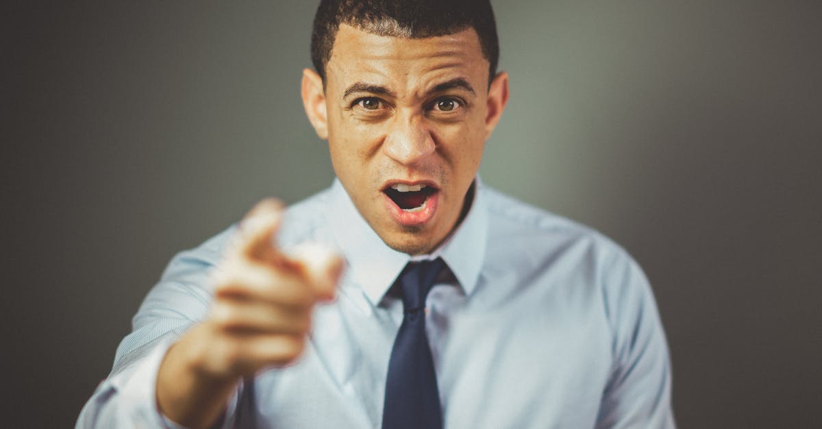 How do you know if Americans genuinely/literally mean what they say? - Man Wearing White Dress Shirt With Black Necktie