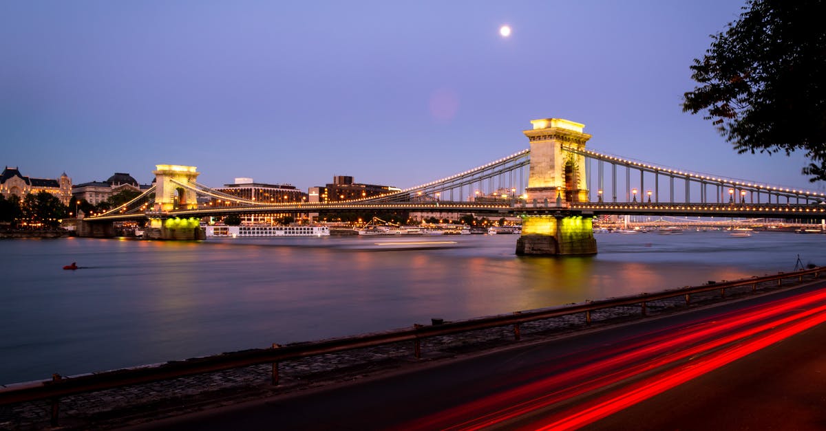 How do you use a Budapest 5/30 travelcard? - Time Lapse Photography of Bridge during Night Time