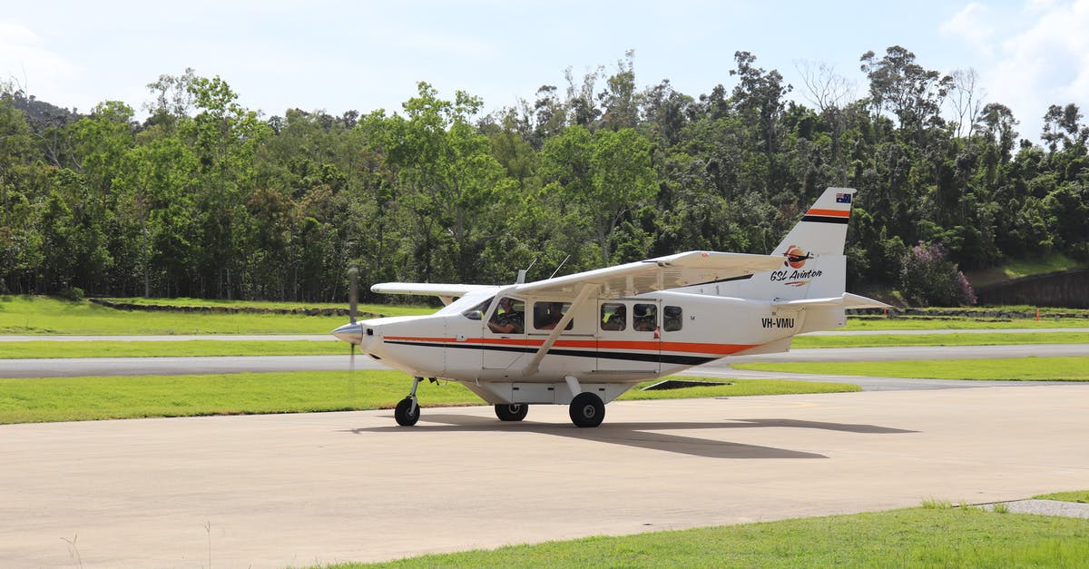 How does a hurricane making landfall between departure and destination affect air travel? - Modern small turboprop plane landing on airfield surrounded with lush green trees in tropical country on sunny day How does a hurricane making landfall between departure and destination affect air travel? - Modern small turboprop plane landing on airfield surrounded with lush green trees in tropical country on sunny day