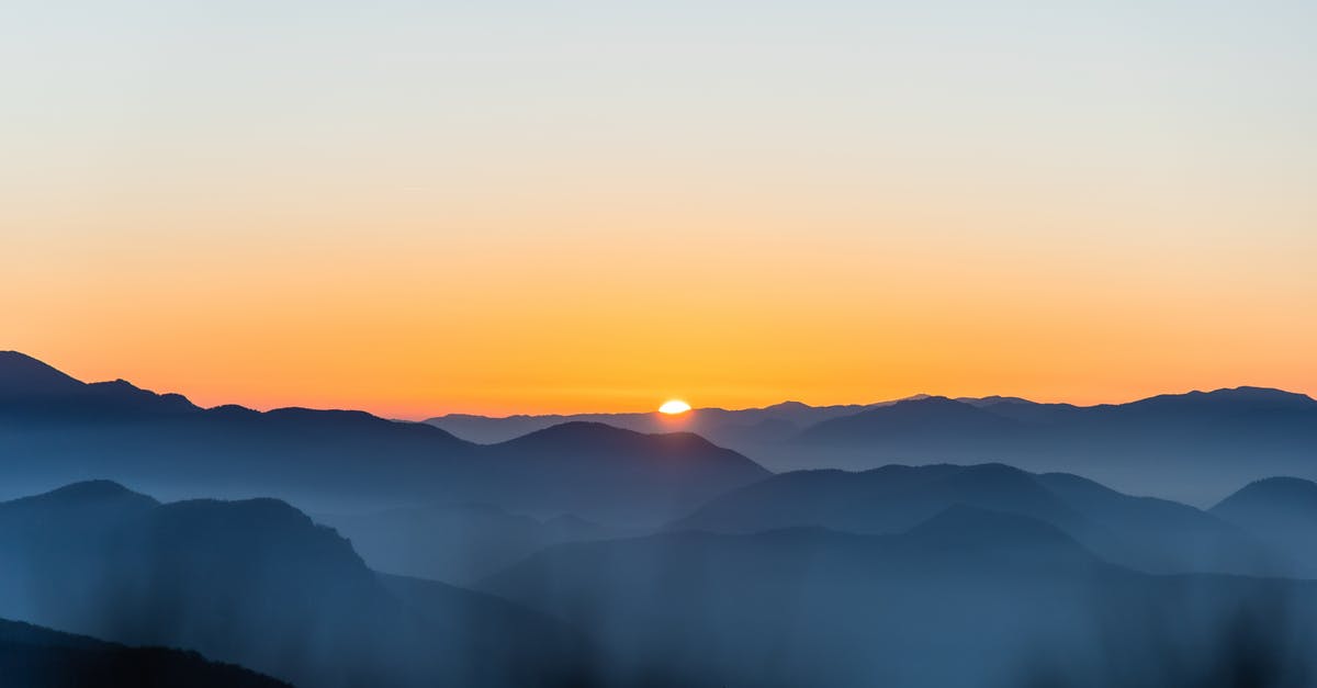 How early could I get into the Colombo airport? - Silhouette Photography of Mountain