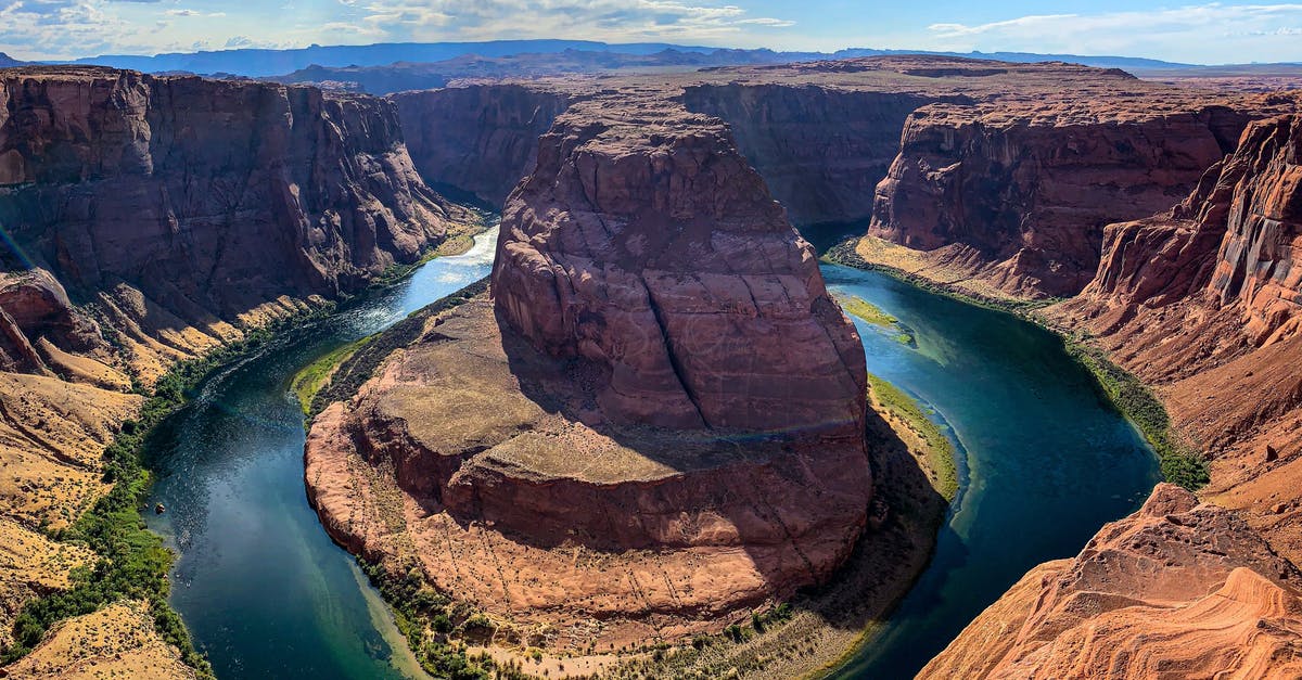 How fit does one need to be for the Grand Canyon rim-to-rim - Brown Rock Formation Near Body of Water How fit does one need to be for the Grand Canyon rim-to-rim - Brown Rock Formation Near Body of Water