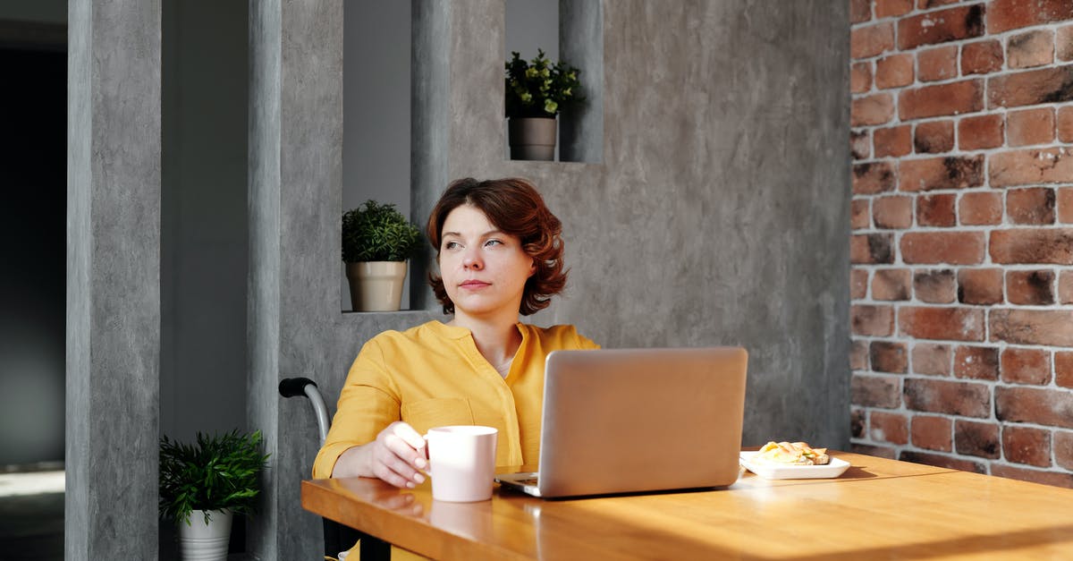 How impairing are current Australian quarantine procedures? - Photo of Woman Sitting by the Table While Looking Away