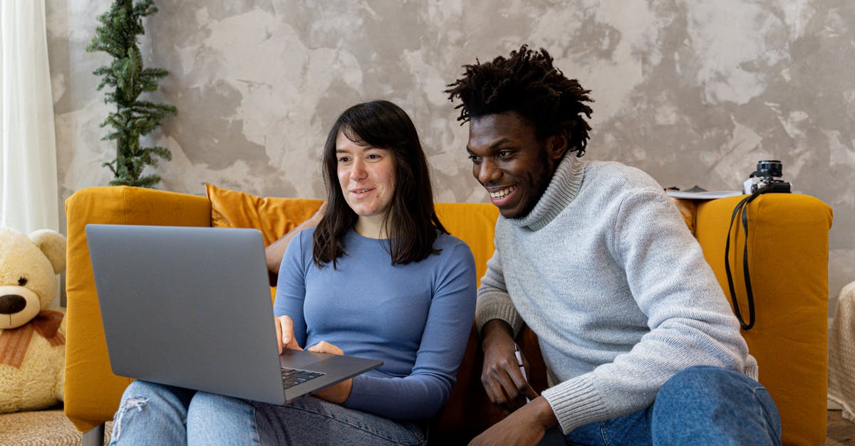 How long does it take to get a Netherlands visa? - Man and Woman Using Laptop