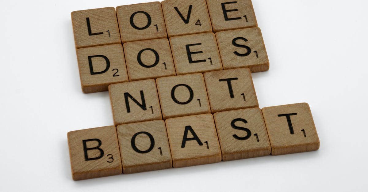 How much does a Ghanaian "Visa on Arrival" cost? - Close-Up Shot of Scrabble Tiles on a White Surface