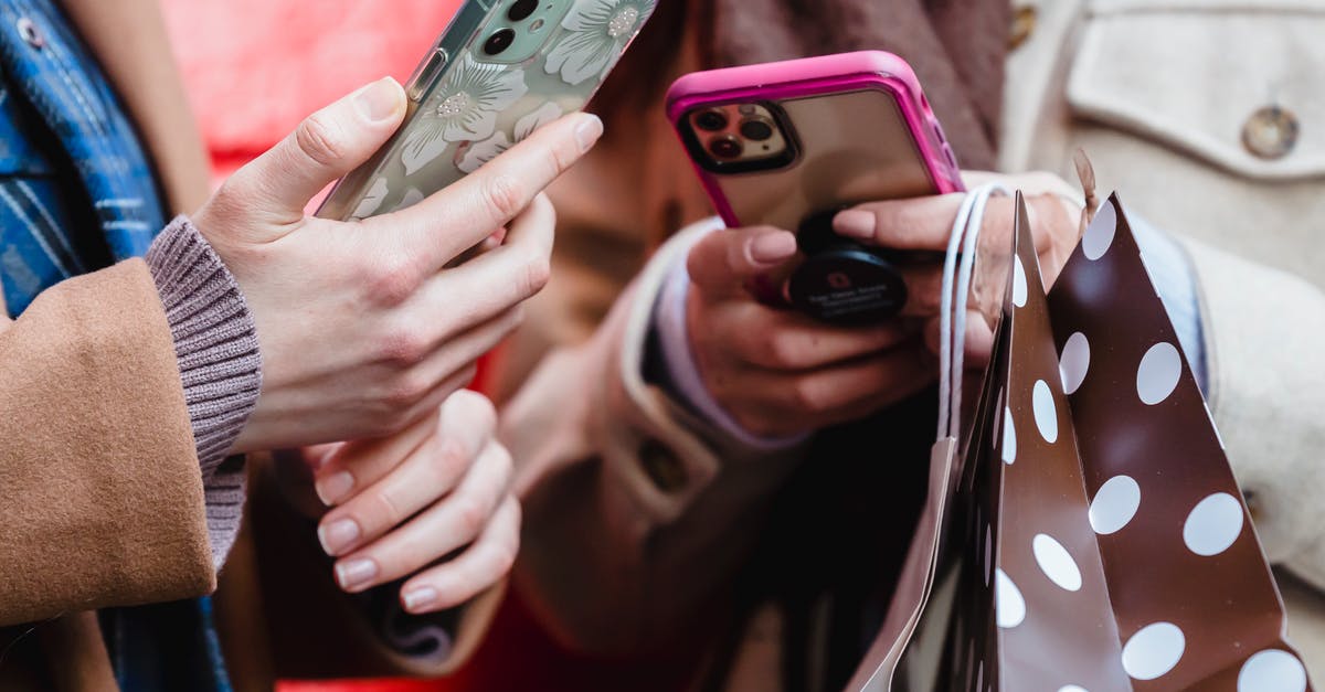 How much time for connection and customs in Charlotte? [duplicate] - Unrecognizable ladies messaging smartphones on street
