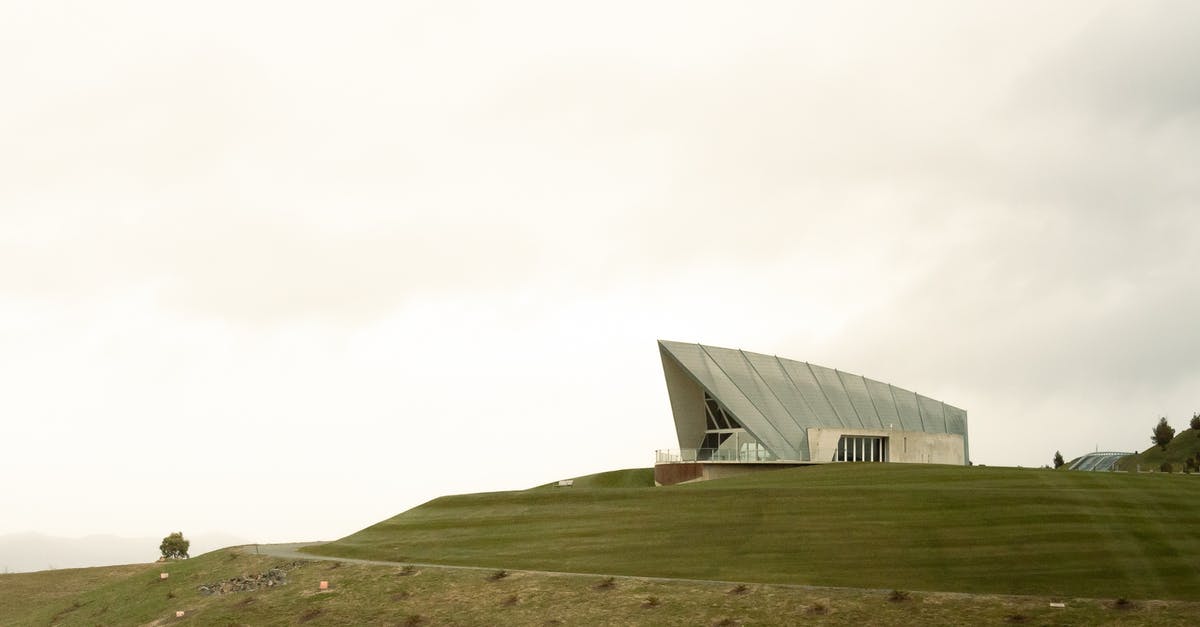 How to Apply for a Chilean Visa in Canberra, Australia - White Building on Green Grass Field Under White Sky