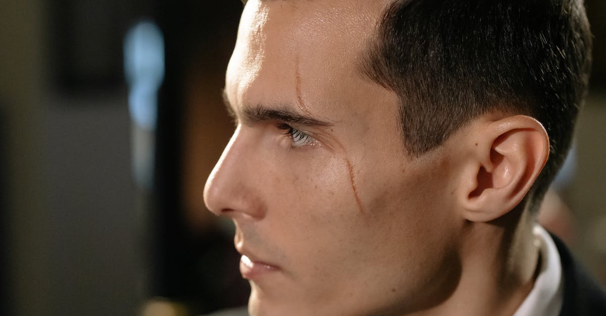 How to assess whether a restaurant is good on the spot? - Close-Up Photo of Man with Scar on his Face