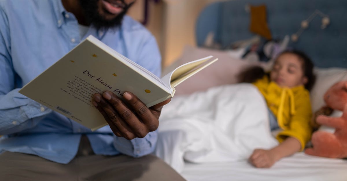 How to book entire compartments on French night trains? - A Father Reading Bedtime Story to His Daughter