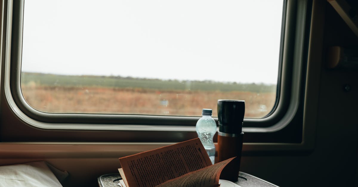 How to book transportation in Bali? -  Table near a Window inside a Vehicle