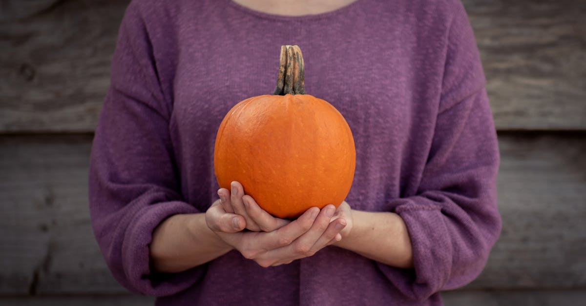 How to carry a Squash racket on Thai Airways? - Photo of Woman Carrying Pumpkin on Both Hands