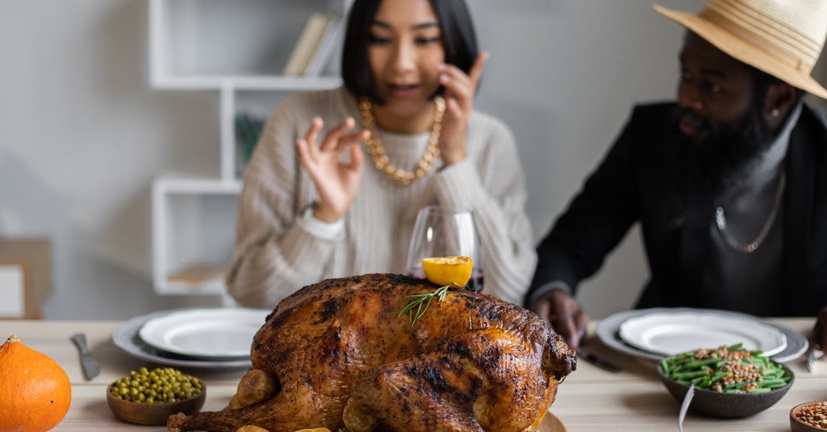 How to eat a meal with locals in Turkey? - Diverse couple at table with turkey