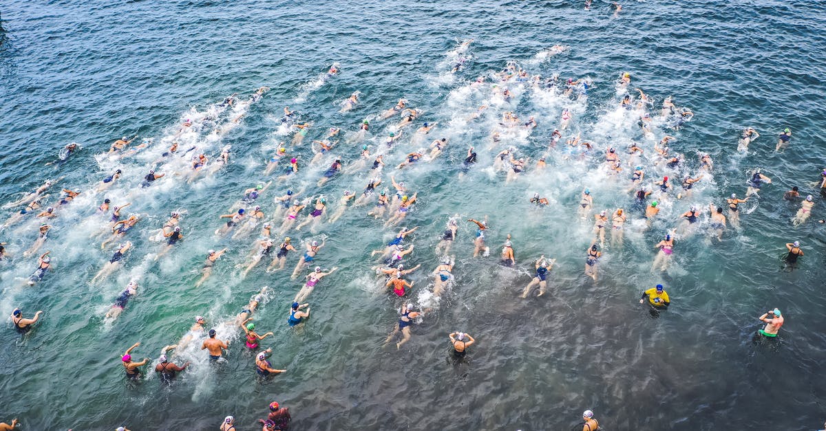 How to enter from Russia to Abkhazia? - People entering water during swim challenge