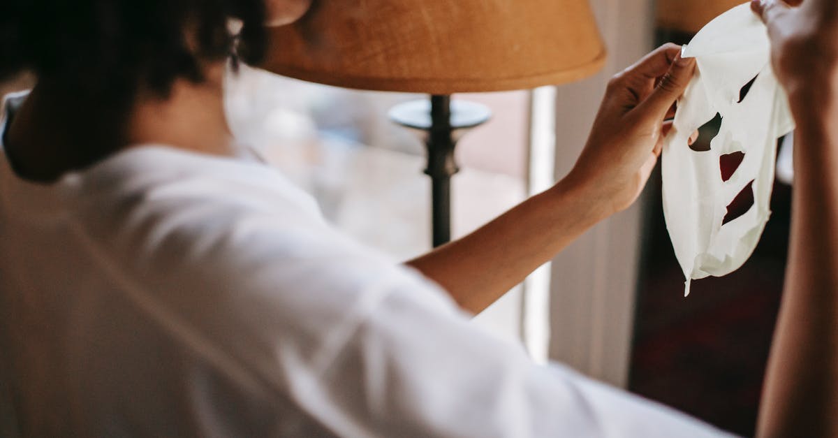 How to find accommodation when what you reserved appears to be overbooked, or worse, non-existent? - Black female holding moisturizing sheet mask in room How to find accommodation when what you reserved appears to be overbooked, or worse, non-existent? - Black female holding moisturizing sheet mask in room