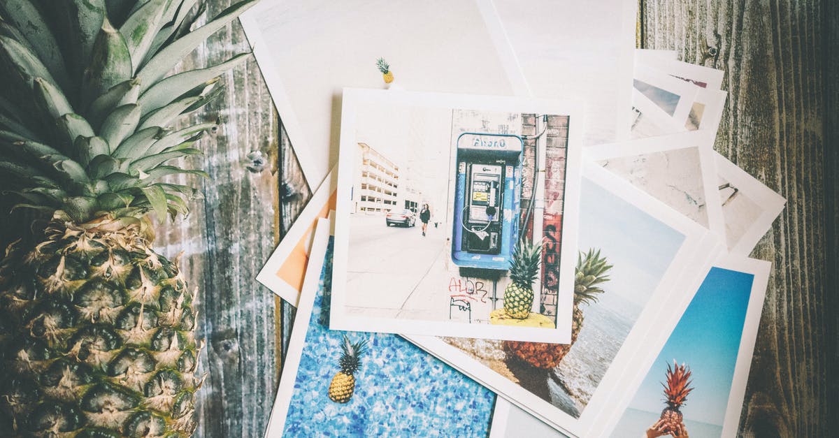 How to find (and choose!) picture postcards in China? - Assorted Photo Beside Pineapple on Top of Brown Surface