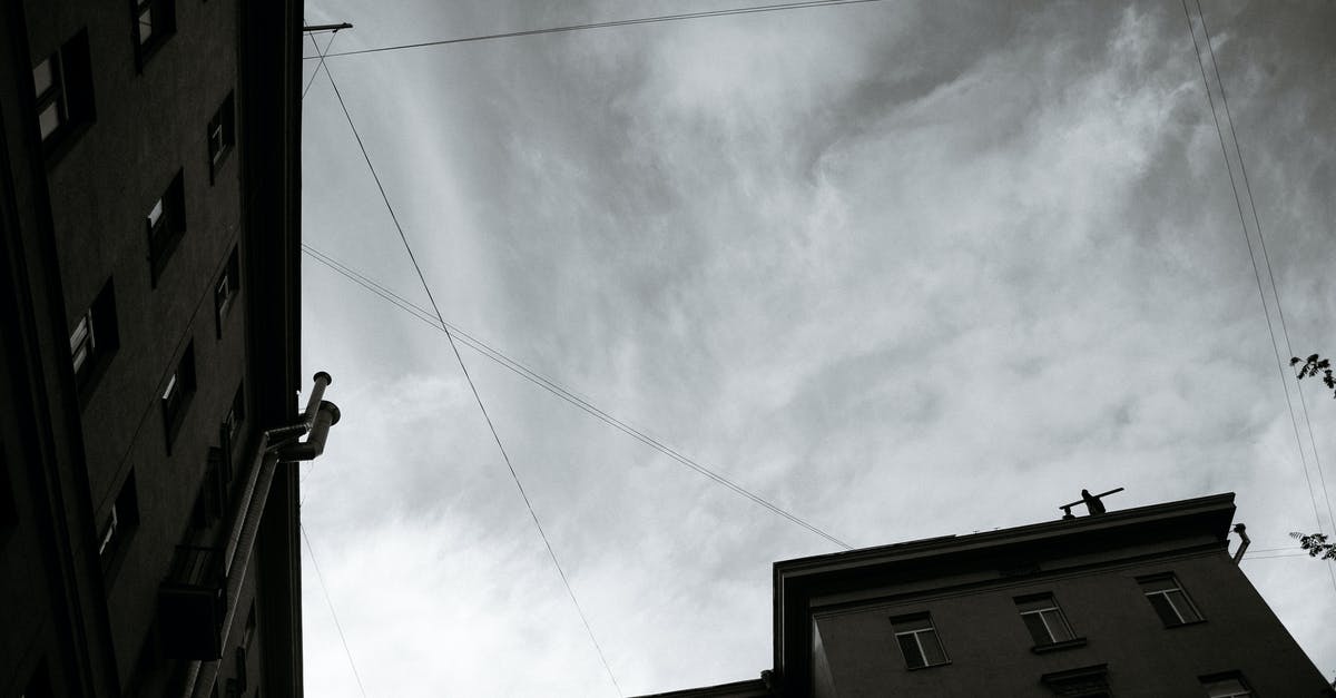 How to find cities with similar weather conditions - Low Angle Shot with City Buildings and the Sky