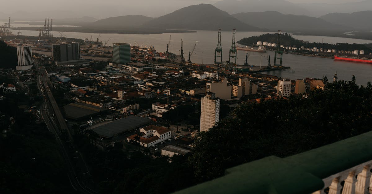 How to find operators of Panama Canal transit tours - Dock with industrial buildings and dock