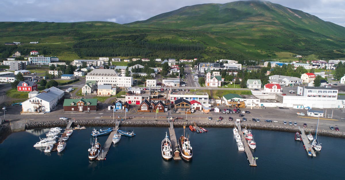 How to get from Iceland to Greenland? - Amazing view of Husavik harbor in Iceland in summertime