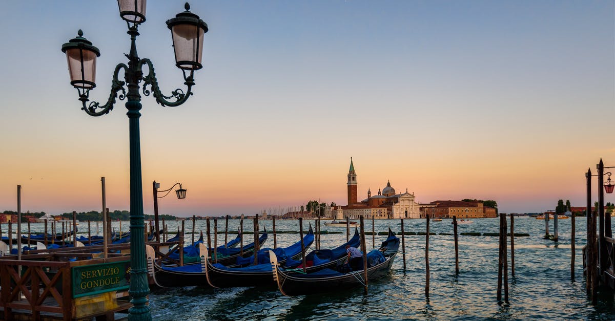 How to get from Venice to Rijeka, Croatia by sea? - Green Metal Post in Front of the Body of Ocean With Boats during Twilight