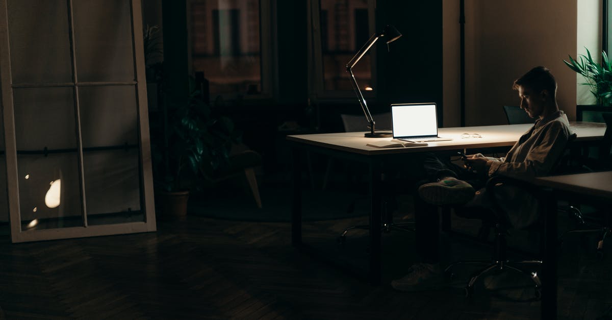 How to get visa to stay longer in US? - Silver Macbook on White Table