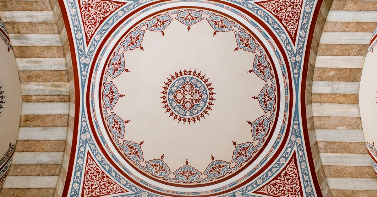 How to go from Kars, Turkey to Georgia? - From below of oriental colorful ornate on dome in ancient Muslim mosque in Turkey