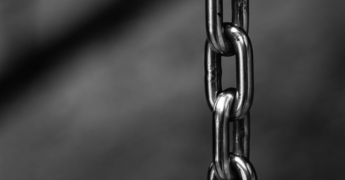 How to lock a backpack? - Grayscale Photography of Chain