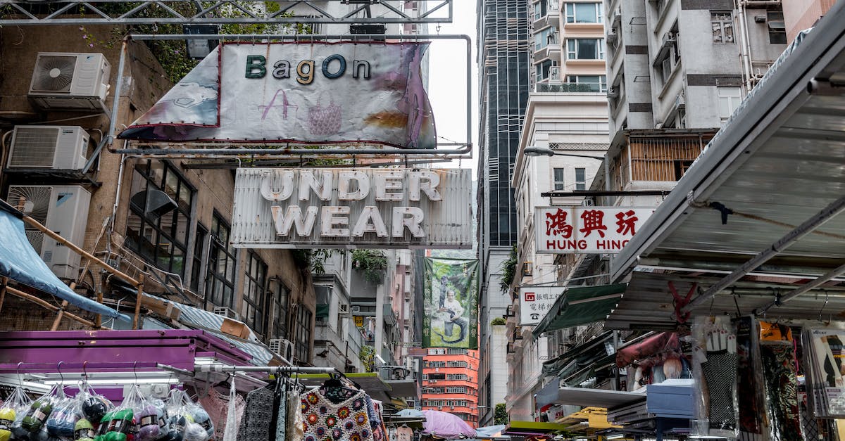 How to manage/store luggage for an afternoon in Hong Kong? - Free stock photo of architecture, battle, billboard