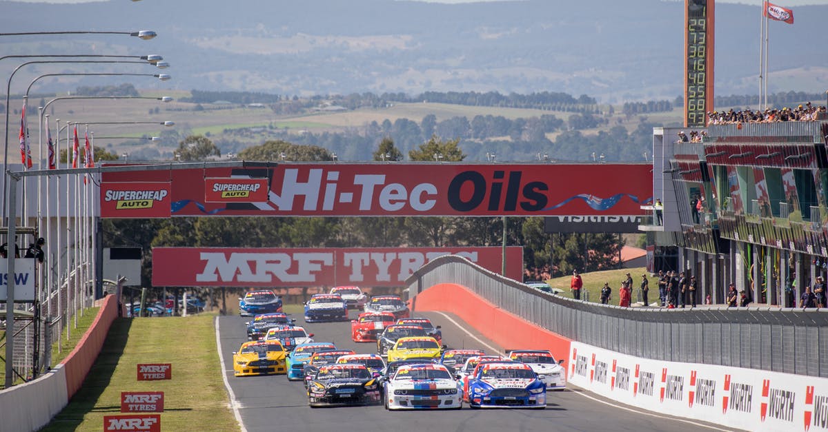 How to Obtain Fast Track Entry to Australia - Blue and White Racing Car on Race Track