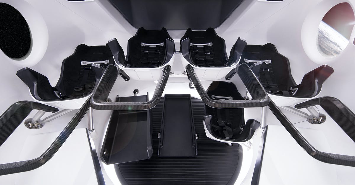 How to protect myself from multi-leg flight getting delayed? [duplicate] - From below of comfortable astronauts chairs inside of modern spacecraft simulator located in modern station