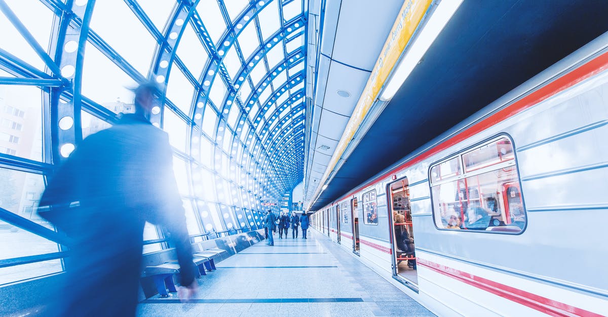 How to reach Dongzhimen Metro station from Beijing Capital Airport? - People at Train Station