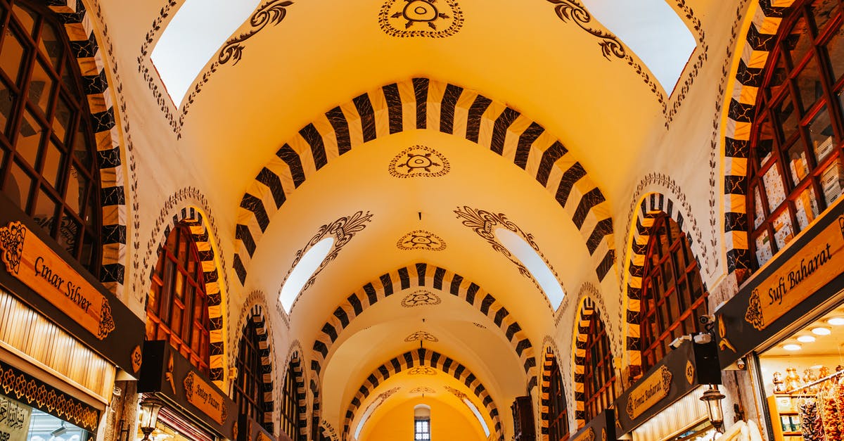 How to recognize a good sushi place when abroad? - Ornamental ceiling with arched windows in market