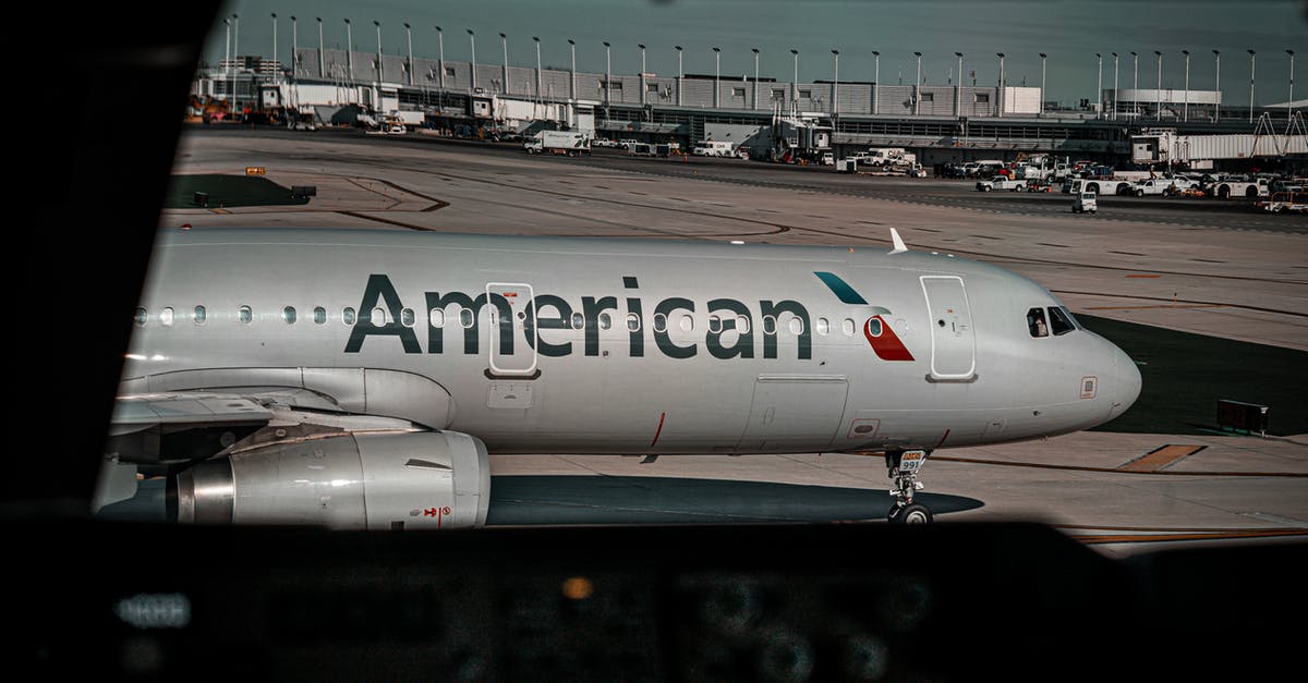 How to redeem an American Airlines voucher? - An American Airline Passenger Plane in the Airport