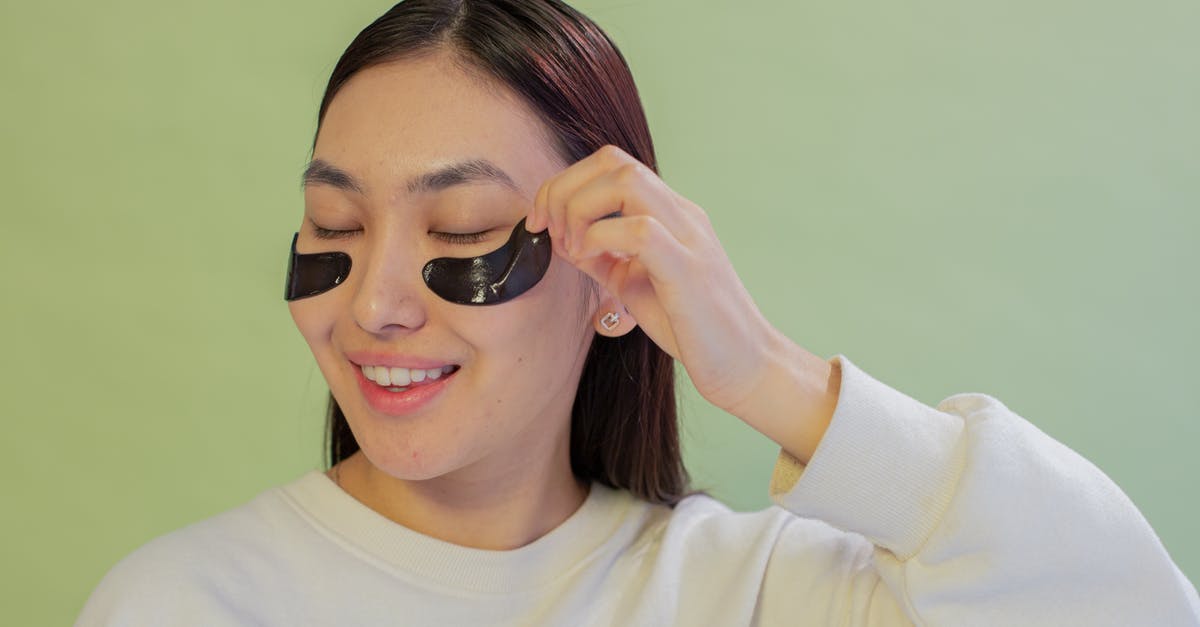 How to remove ban of 320 7a [closed] - Smiling Asian teen removing eye patch from face