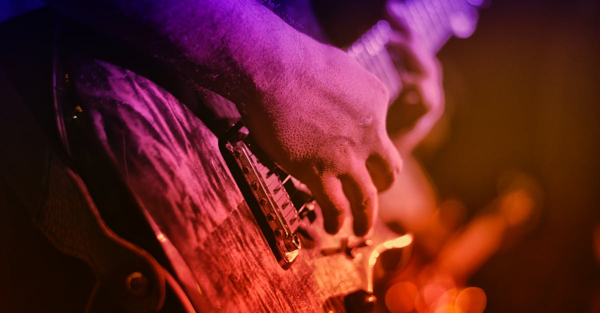 How to see the light show at Galata Tower? - Person Playing String Instruments