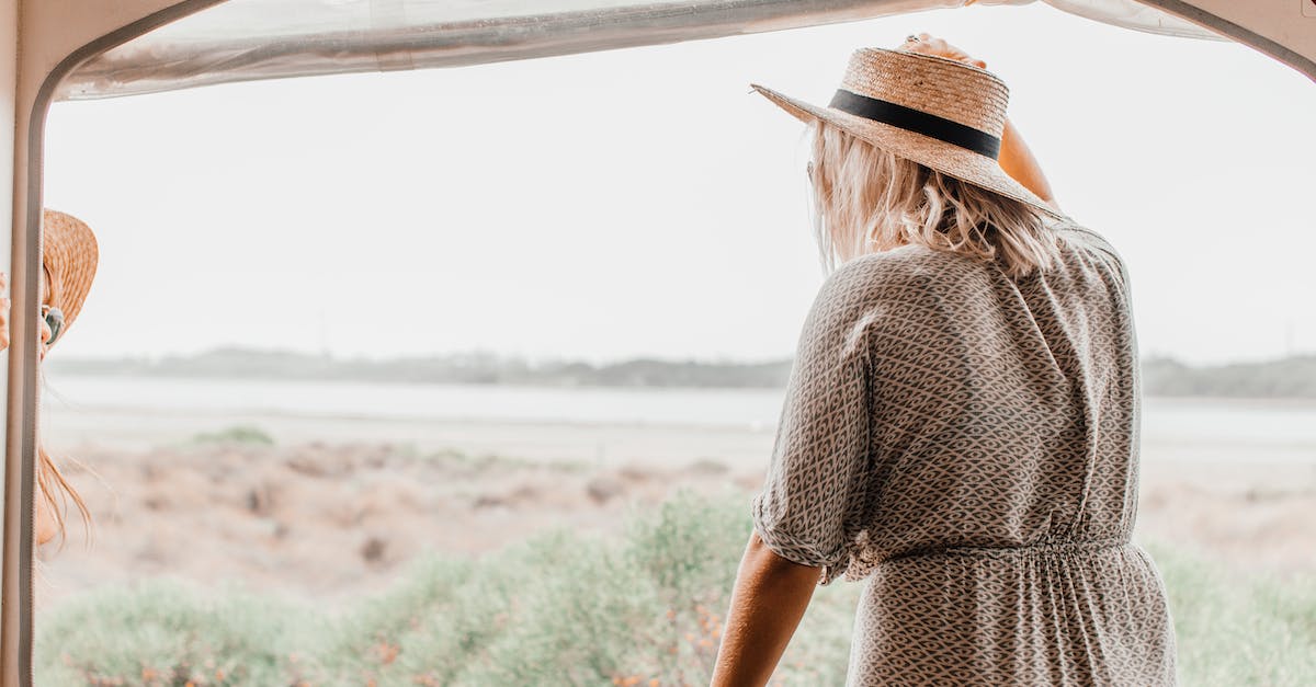 How to select the perfect travel hat [closed] - A Woman Wearing a Hat