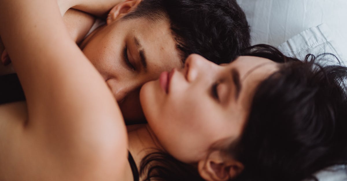 How to sleep in twins beds that are pushed together? - Close Up of Two Women Sleeping Together