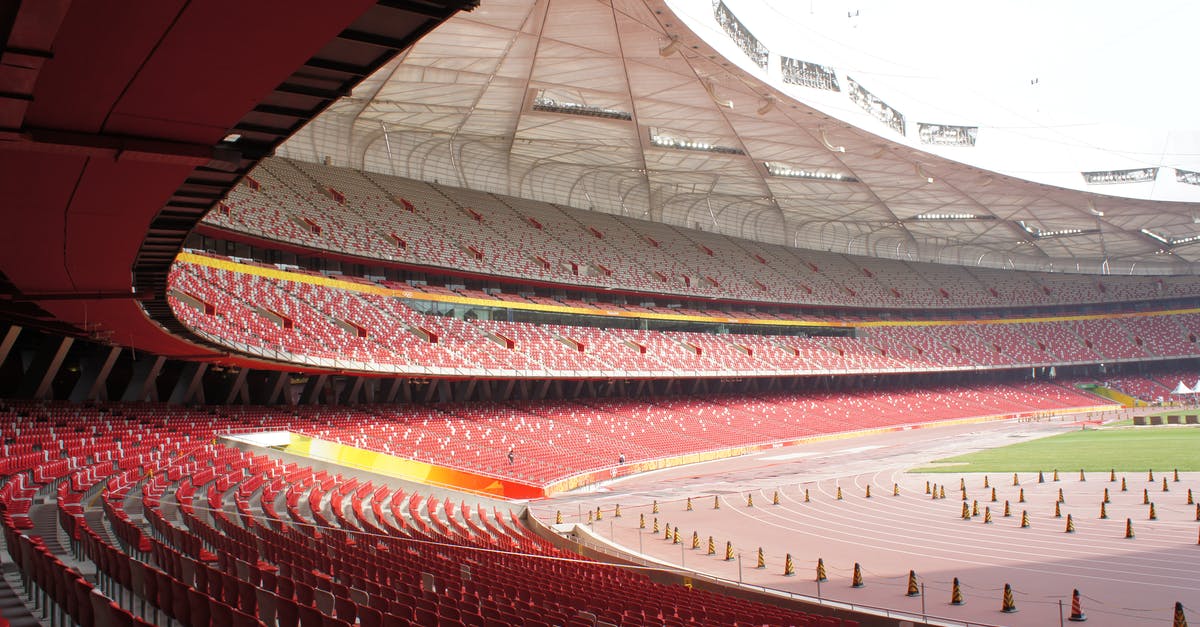 How to track buses in China? - An Empty Stadium With Red Seats