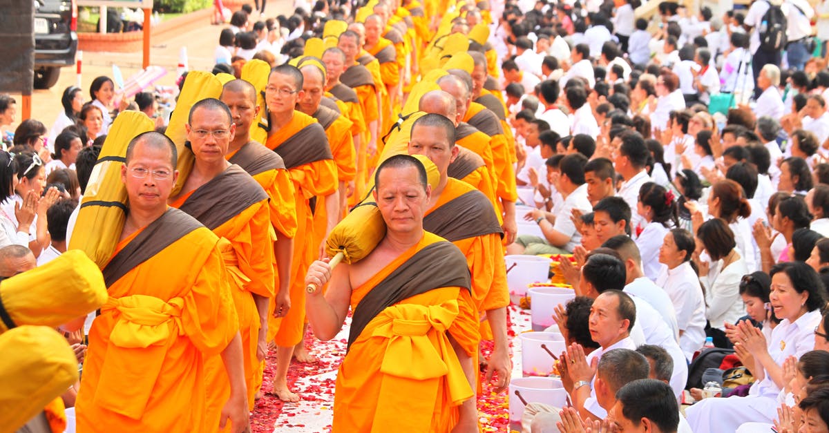 How to travel to Bangkok, Thailand from Siem Reap, Cambodia? [closed] - People Gathered Outside