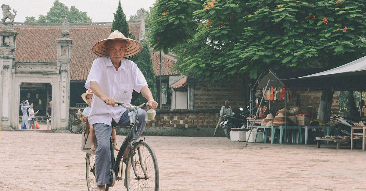 How to travel with a (small) child in Vietnam? - Man Riding Bike