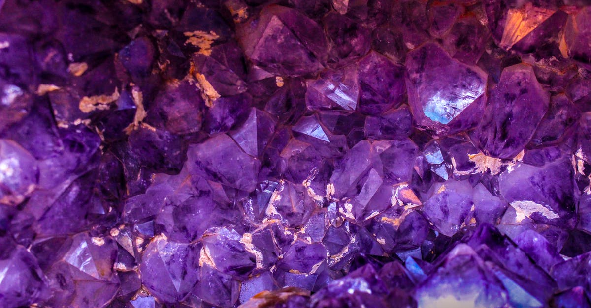 How to visit Jewel in Changi on layover without paying extra? - Closeup Photo of Purple Gemstones