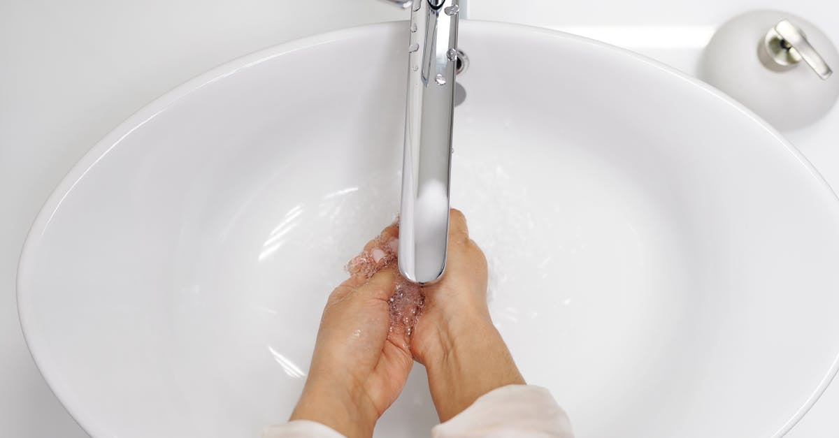 How to wash hands if tap water is too hot? - Woman Washing Her Hands With Soap