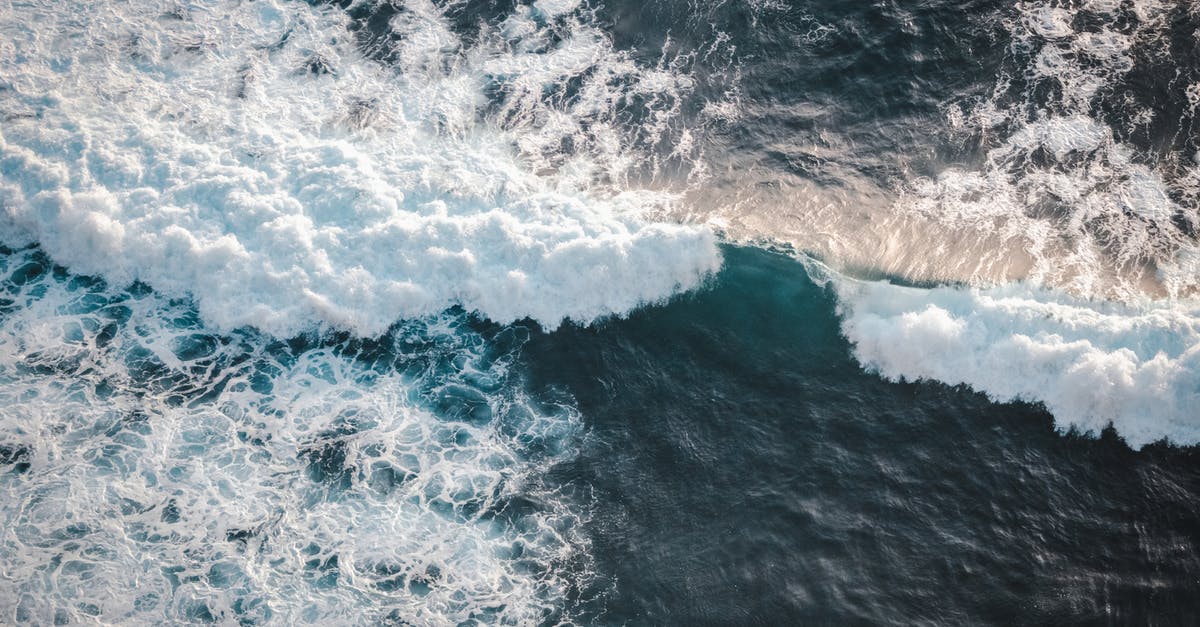 I'm from Israel, do I need power adapters for Nepal? - Stormy ocean with foamy waves in daylight